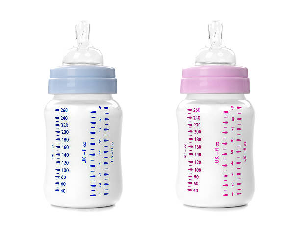 istock Breast Milk in Pink and Blue Bottles 183828767