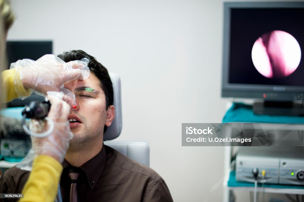 Rhinoscopy in the Hospital Rhinoscopy in the Hospital, otolaryngologist doctor... Nose control, patient has complaints in his ear... Nose Stock Photo