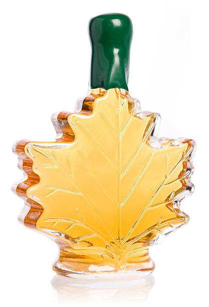 istock A bottle of maple syrup with green cap 183829733