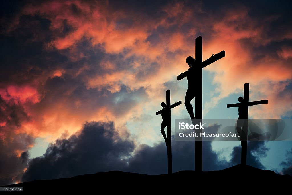 Christian Jesus Christ son of god crusified on wooden cross Crucified Jesus Christ over  gloomy skies.More religious images: Religious Cross Stock Photo