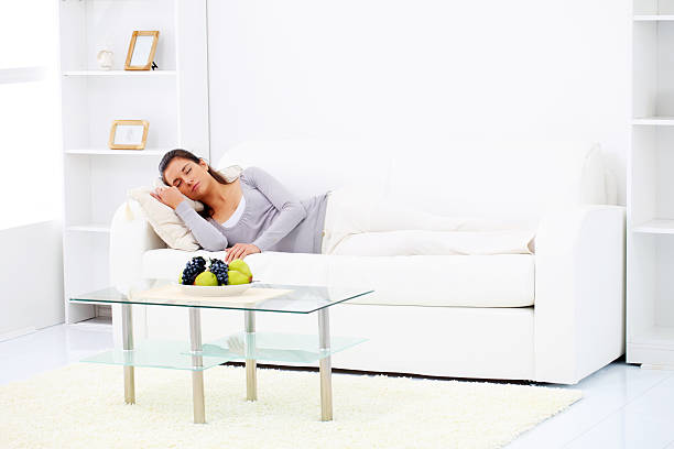 istock Young woman sleeping at home. 183829927