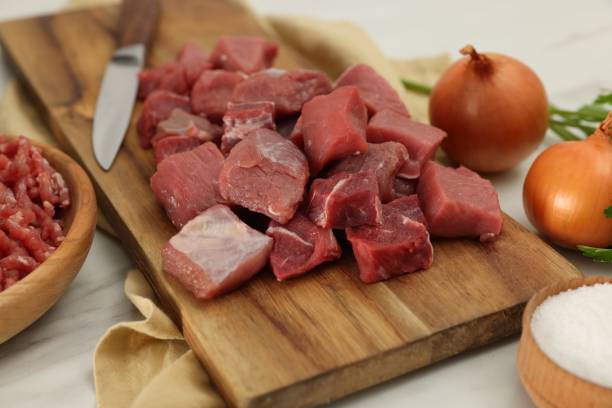 istock Cut beef meat and products on white table, closeup 1838299910
