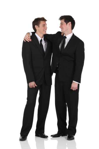 Two businessmen smiling at each otherhttp://www.twodozendesign.info/i/1.png