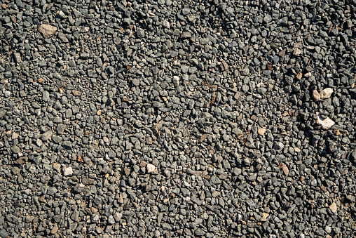 Fine gray gravel as background or texture. High quality photo