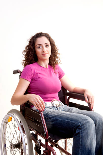 Young woman portrait sitting in wheelchair