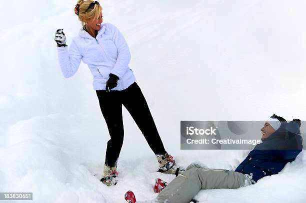 Couple On The Snow Stock Photo - Download Image Now - Family, Snowshoeing, European Alps