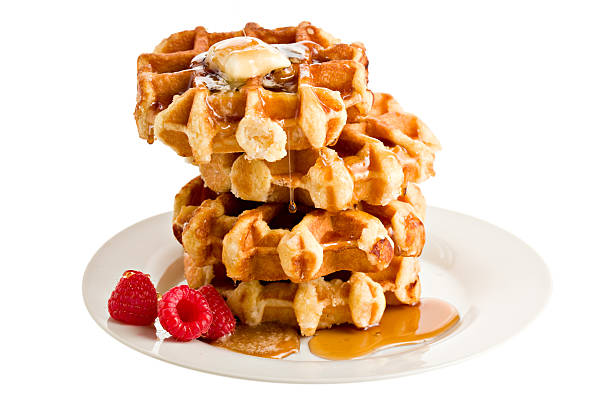 stack of belgian waffles - stroopwafel stockfoto's en -beelden