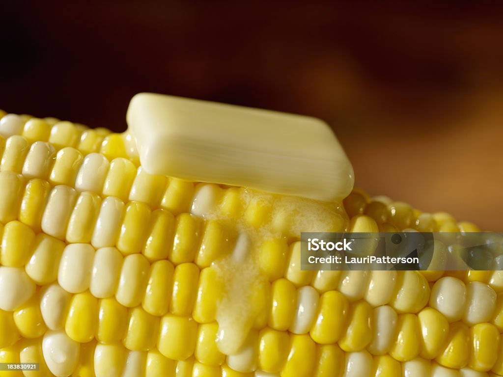 Buttered mazorca de maíz - Foto de stock de Mantequilla libre de derechos
