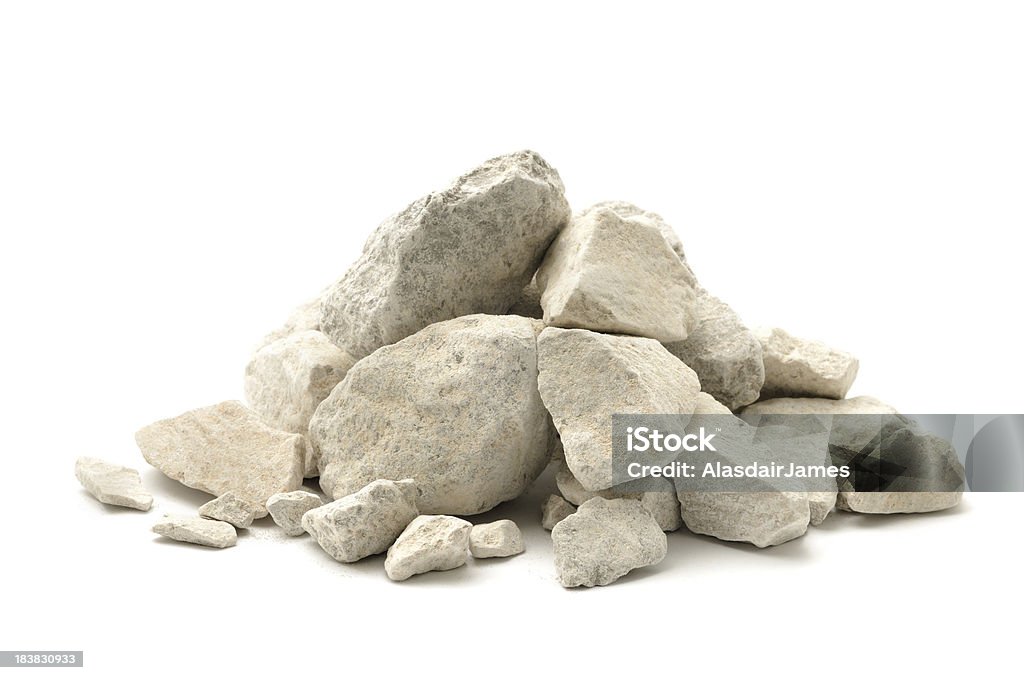 Limestone chippings Stone and dust (limestone) isolated on a white background. Rock - Object Stock Photo