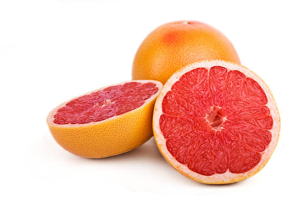 Grapefruit isolated on acrylic black background. High resolution photo. Full depth of field.