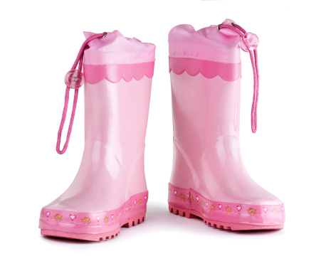Childs pink boots on white background.Clipping path included.