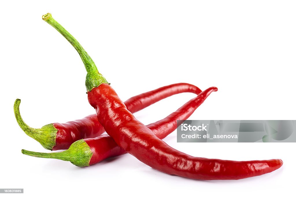 red chilli peppers isolated on white Chili Pepper Stock Photo