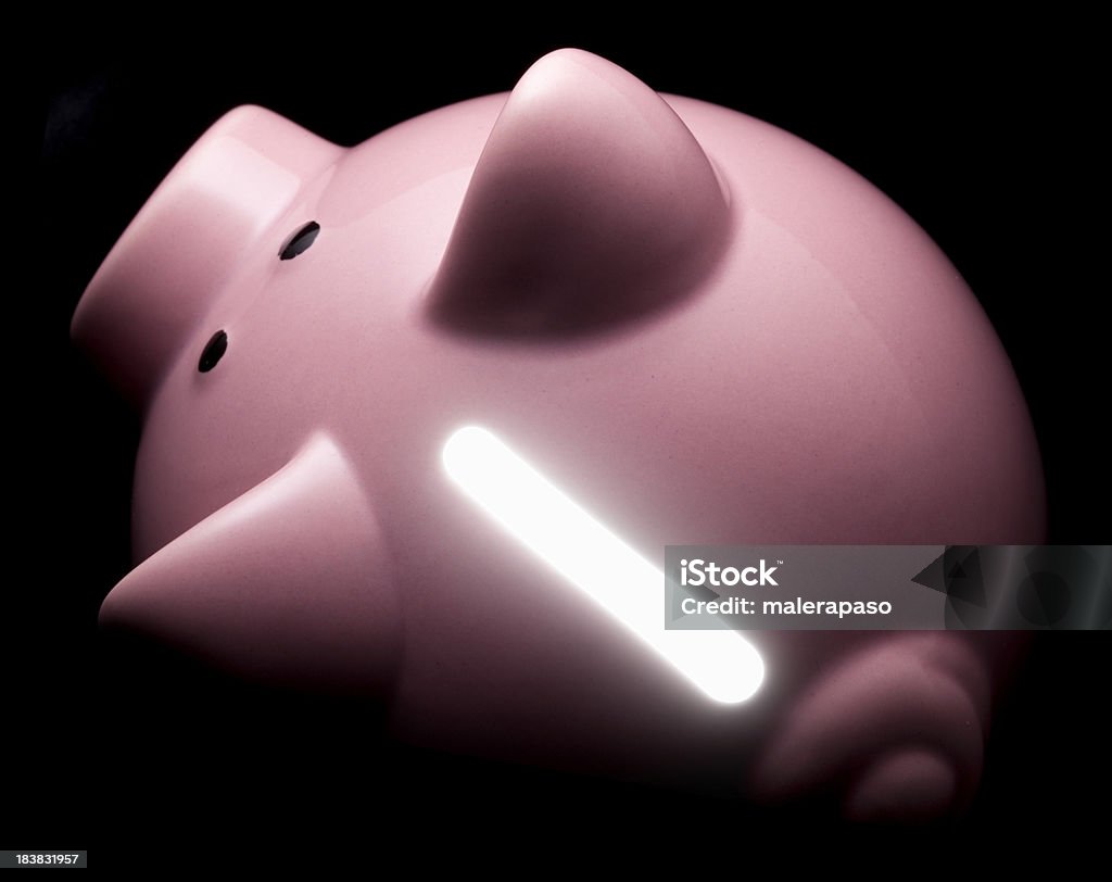 Piggy bank com luz que vem de dentro - Foto de stock de Abundância royalty-free