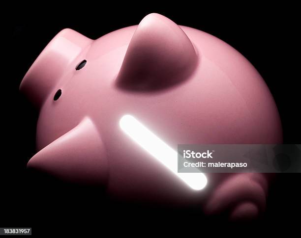 Foto de Piggy Bank Com Luz Que Vem De Dentro e mais fotos de stock de Abundância - Abundância, Aposentadoria, Bringing Home The Bacon-provérbio em inglês