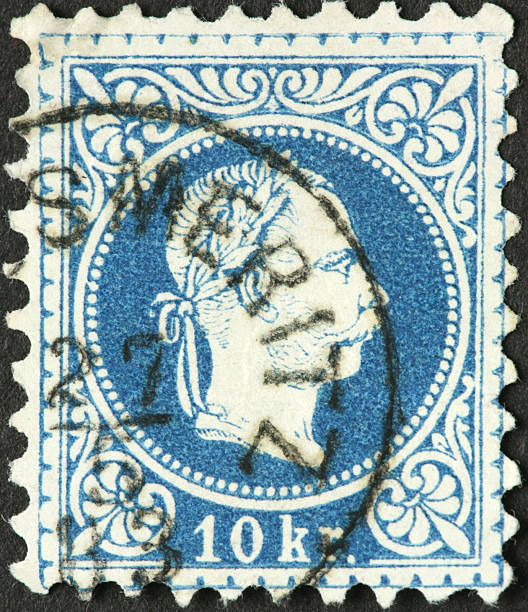 istock male profile with laurel wreath, very old Austrian stamp 183832351