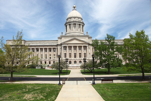 The Kentucky State Capitol is located in Frankfort and is the house of the three branches  of the state government of the Commonwealth of Kentucky.
