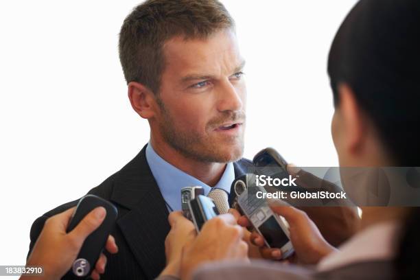 Business Man Giving Interview Stock Photo - Download Image Now - 30-39 Years, Adult, Adults Only