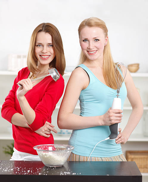 istock Two young women in the kitchen 183833215