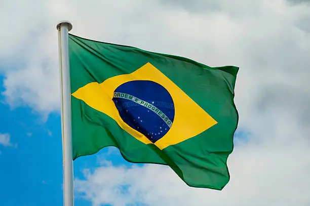 The flag of Brazil waving in the wind.