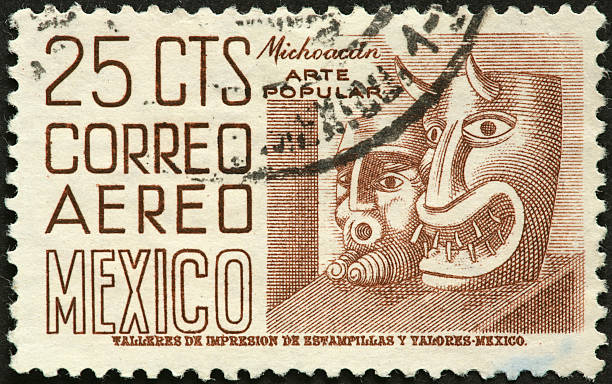 istock Mexican Michoacan masks on a postage stamp 183833894
