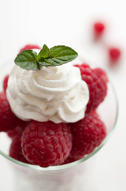 istock Raspberries and Whipped Cream with Copy Space 183834646
