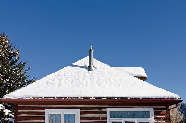 istock Log Cabin With Snow on Roof 183834696