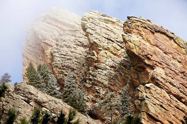 A spring storm clears out over the Royal Arch area in the Flatirons of Boulder Colorado.