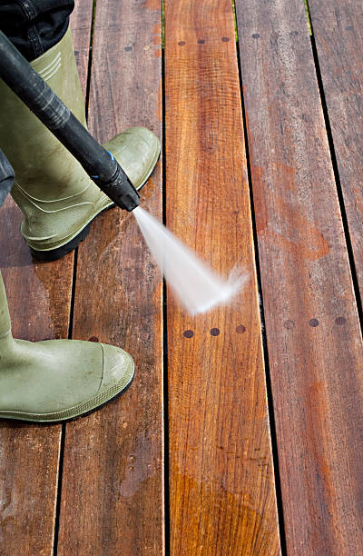 istock Cleaning Patio Decking With a Pressure Hose 183835068