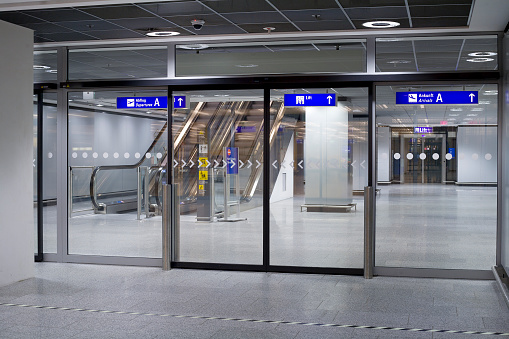 Automated connecting doors and staircase at the airport