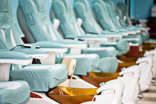 Nail Salon Pedicure chairs stock photo