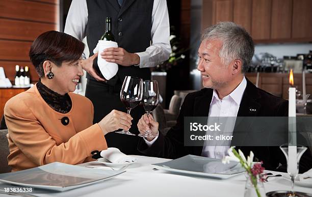 Happy Mature Japaneese Couple Dating In The Restaurant Stock Photo - Download Image Now