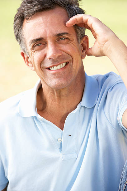 istock Man Relaxing In Countryside 183836399