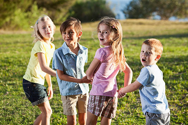 istock Four children at the park 183836534