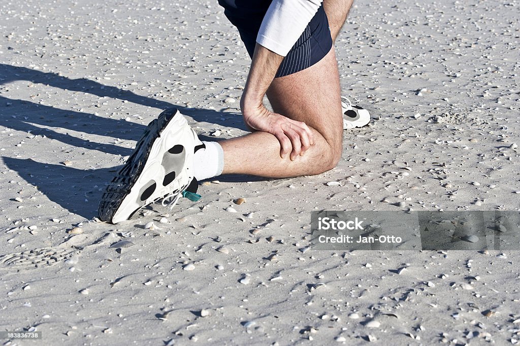 Schmerzen in Kalbsleder - Lizenzfrei Badeort Strand Stock-Foto