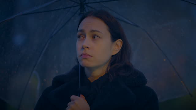 Disappointed Female Person in Miserable Mood Holding Umbrella