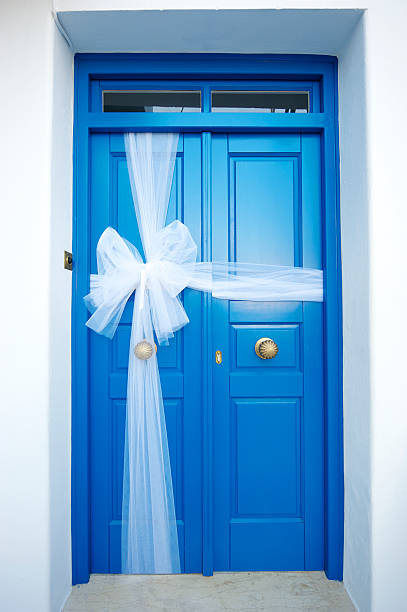 Turquoise wooden door in world famous Positano. Amalfi coast, Italy