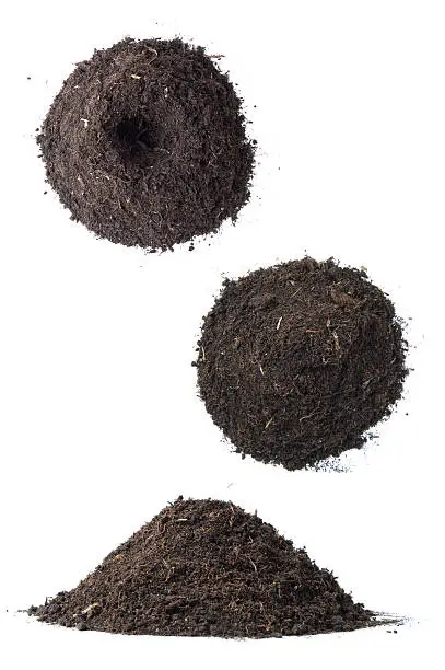 Humus soil molehills. isolated on white.