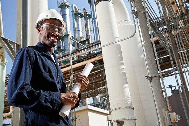 lavoratore industriale americano - manufacturing occupation african descent refinery manual worker foto e immagini stock