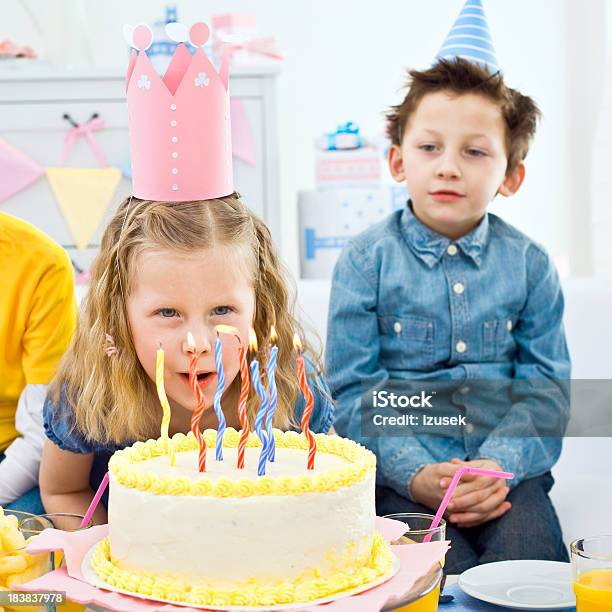 Blowing Out Birthday Candles Stock Photo - Download Image Now - 6-7 Years, 8-9 Years, Birthday