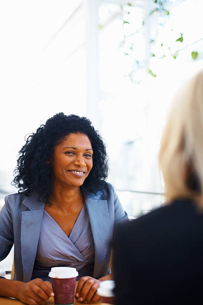 istock Business women having coffee break 183838337