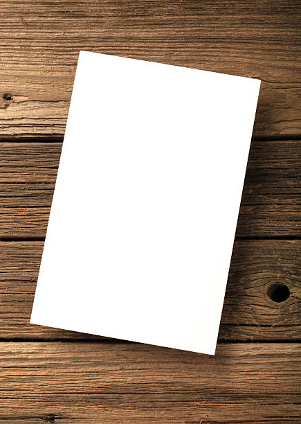 istock Blank sheet of paper on wood 183838637