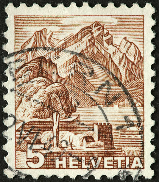 istock Swiss mountains and lake on an old postage stamp 183841151