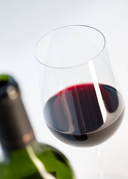 Red wine bottle and glass stock photo