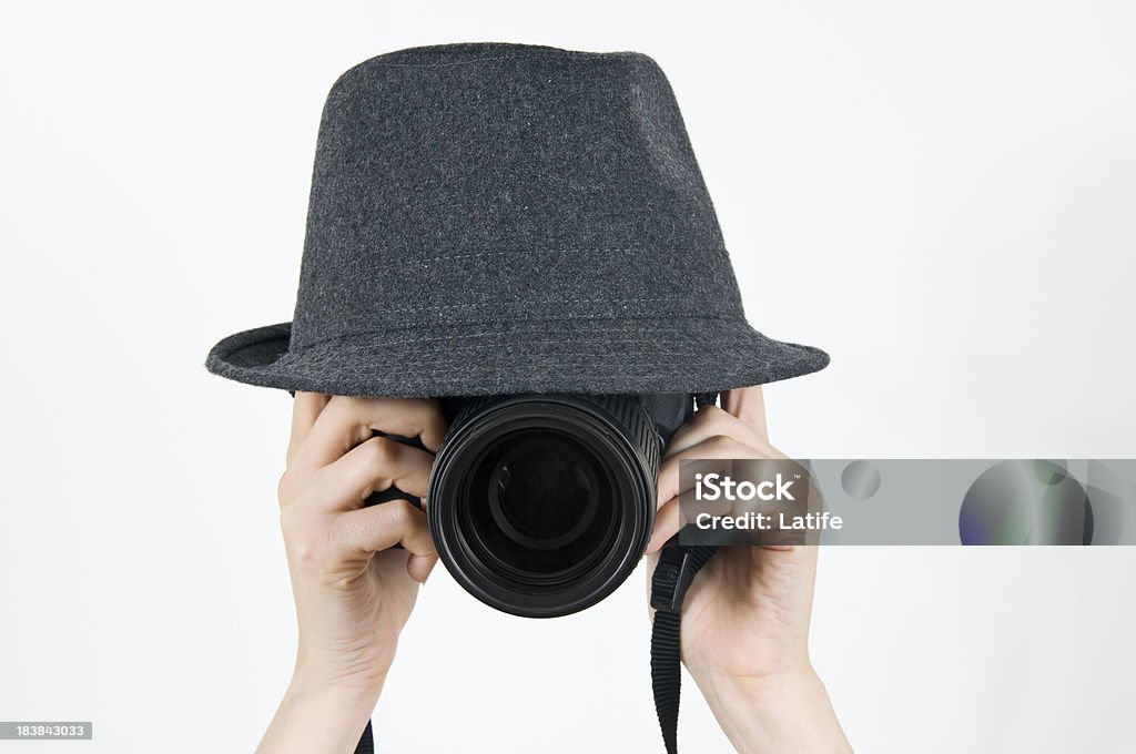 Mysterious Photographer Mysterious photographer is taking picture. Abstract Stock Photo