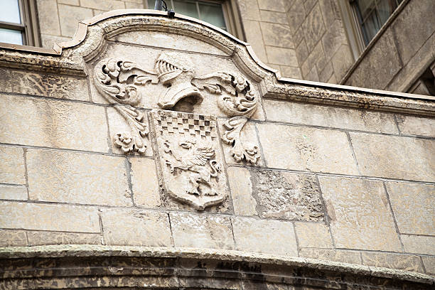 istock Low relief knight with helmet above coat of arms 183843335