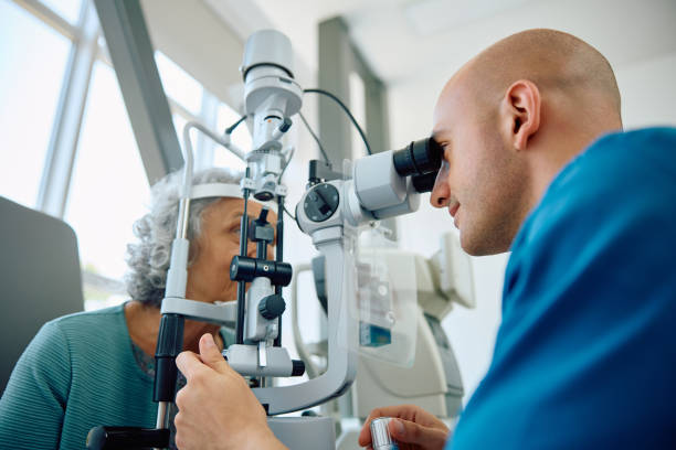 istock Senior woman having her eyes checked by ophthalmologist. 1838440344