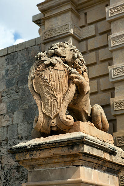 Lion Statue on gate near entrance to village of Mdina Malta