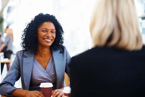istock Business women at cafeteria 183844663