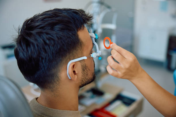 istock Close up of man during eyesight examination at ophthalmologist's office. 1838447793
