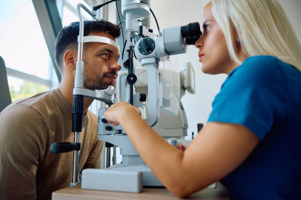 istock Young man having his eyes checked by ophthalmologist. 1838450363